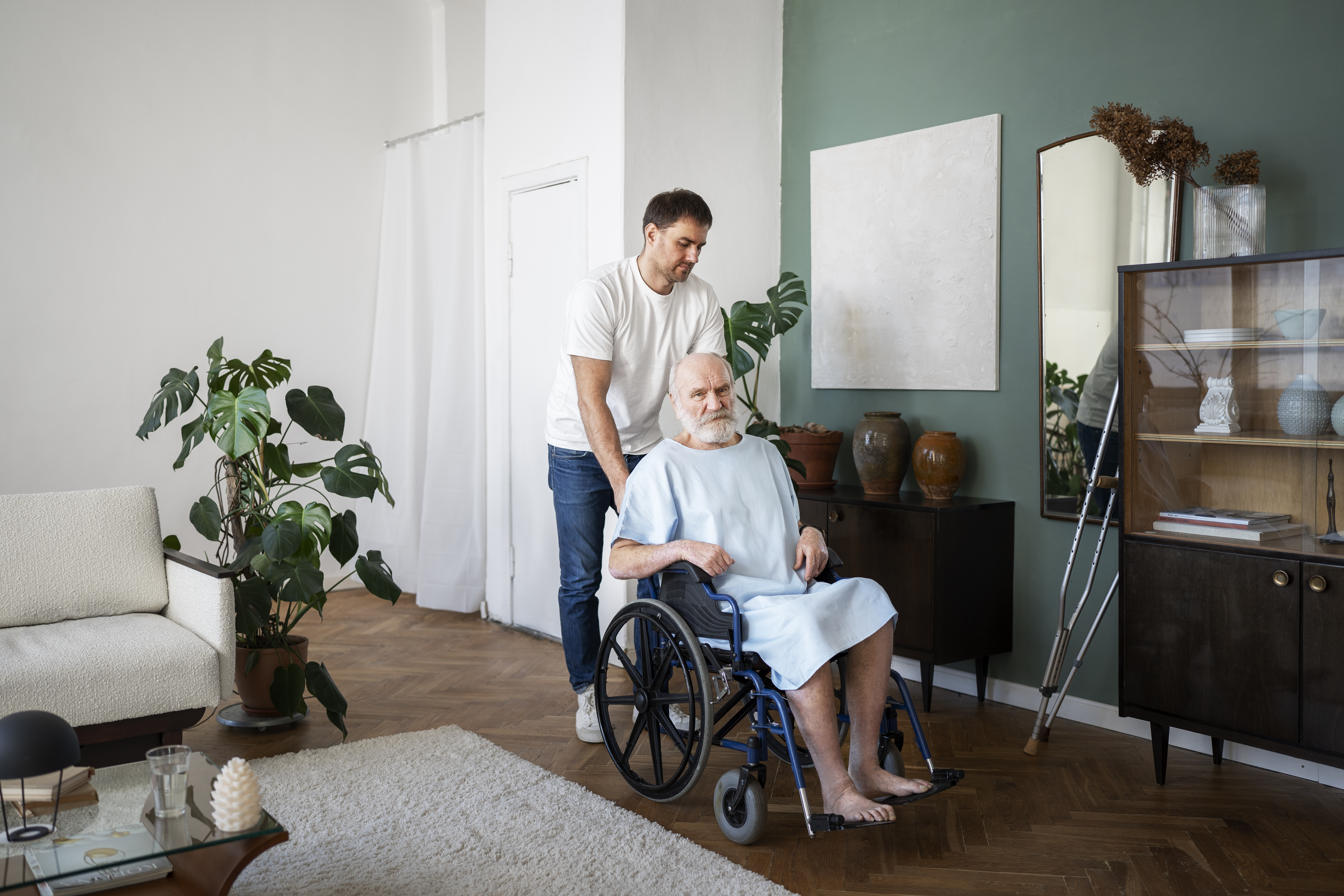 Nurse assisting a patient at home