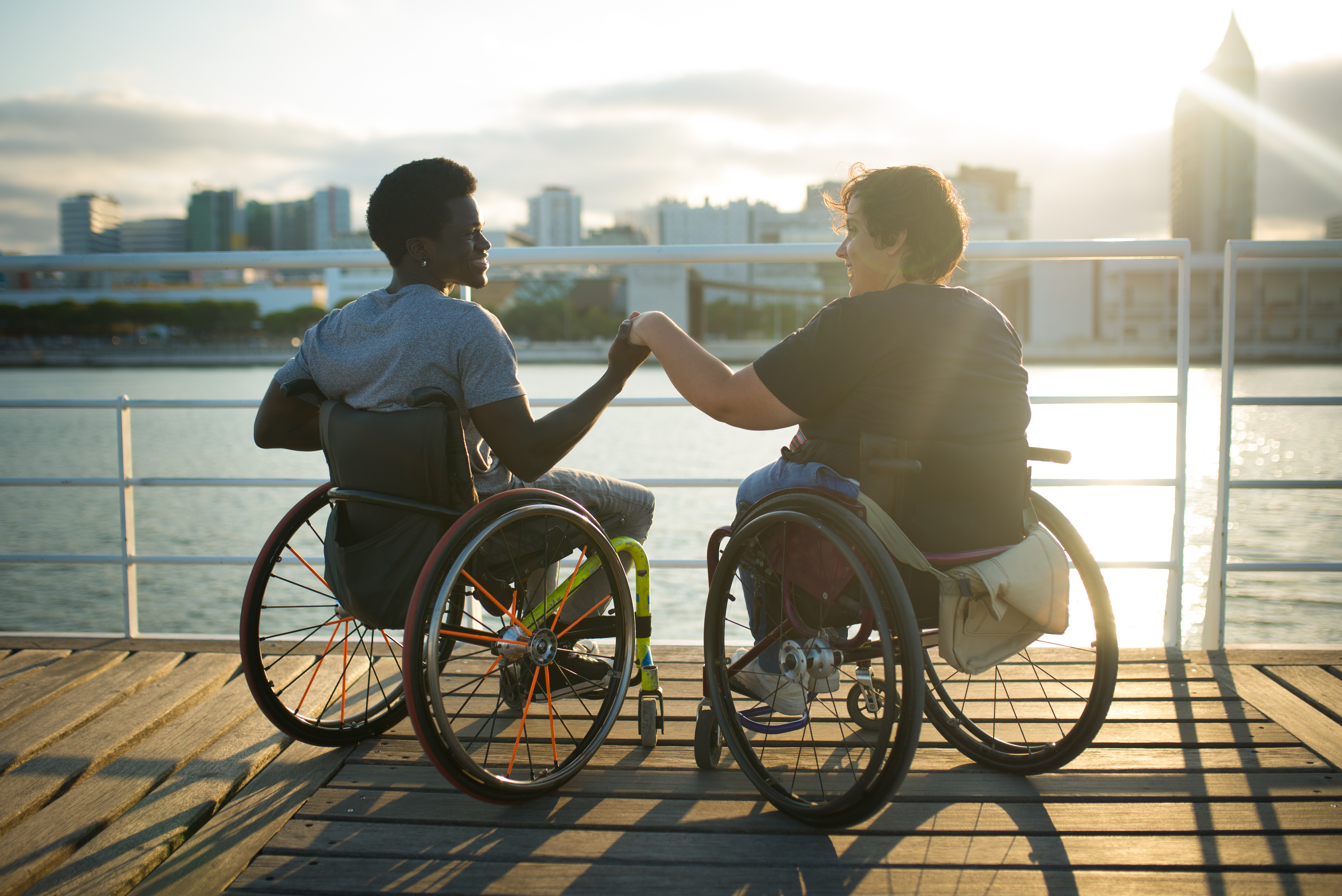 Diverse hands coming together, symbolizing community and NDIS support.